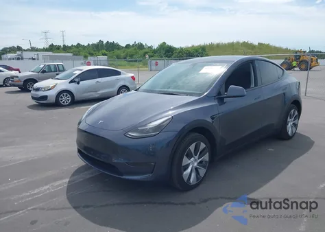 2023 Tesla Model Y Awd/Long Range Dual Motor All-Wheel Drive z USA, uszkodzony, nr VIN 7SAYGDEE8PF786011